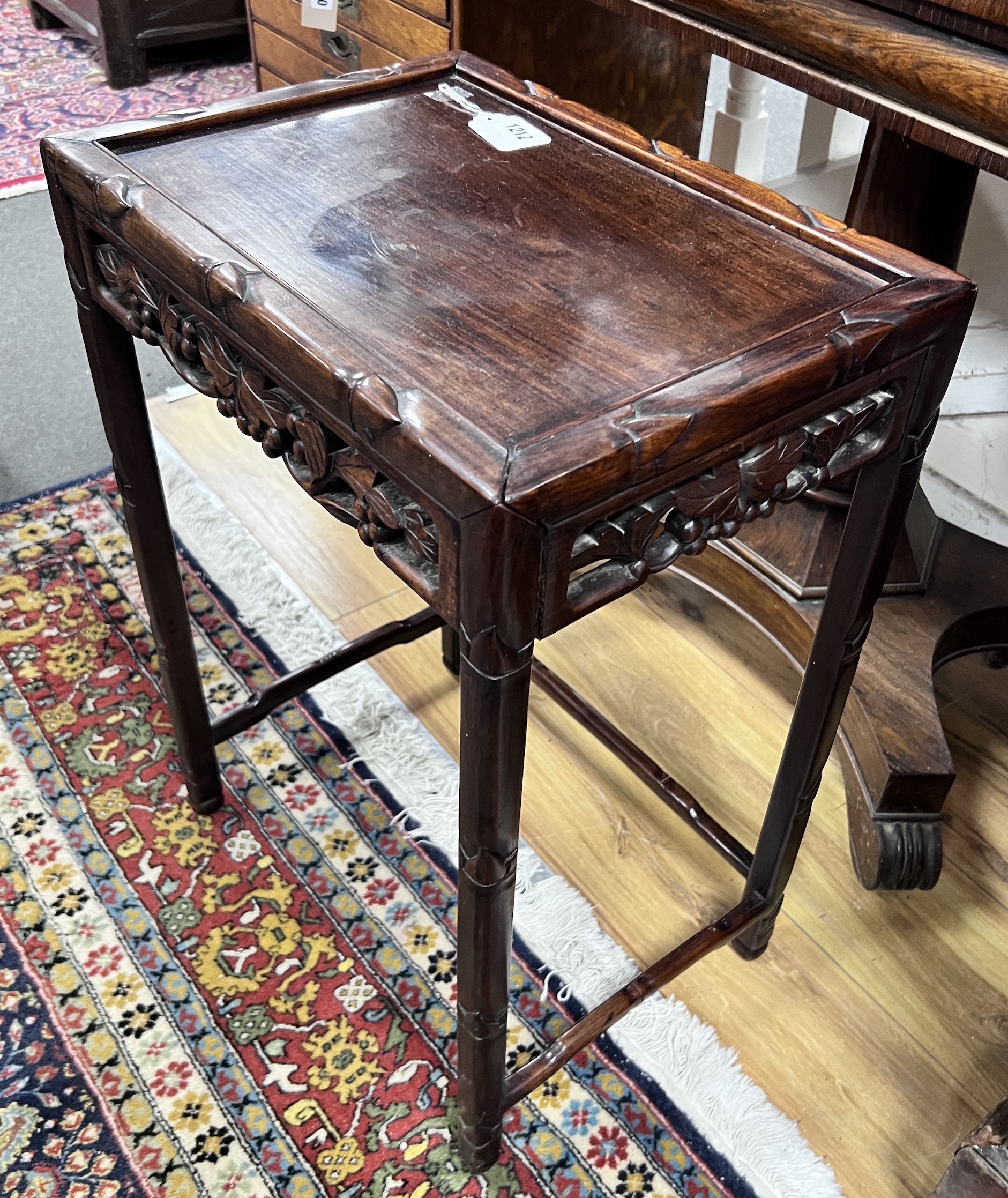 A Chinese hongmu occasional table from a nest, width 43cm